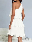 White one-shoulder tiered dress with stunning shoulder layered stitching
