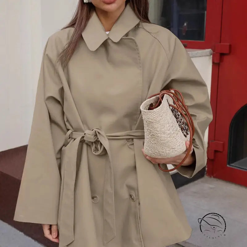 Beige langry fashion trench coat with belt and pocket details