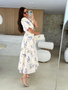 Floral print midi dress featuring puff sleeves, ideal for fashionable Langry styles