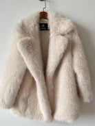 Warm collar mid-length faux fur jacket in cream Langry fashion
