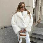 Gorgeous faux fur jacket by Langry: white oversized coat with high collar and buttons