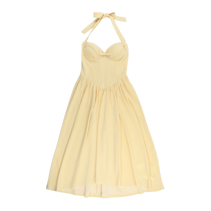 Yellow halter neck langry fashion dress with back bow detail