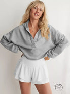 Cozy loose hooded sweatshirt in gray half-zip with white shorts, langry fashion ملابس