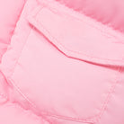 Pink quilted jacket pocket with white stitching in Langry fashion coat vest