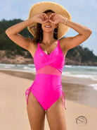 Stunning mesh swimsuit in hot pink two-piece with wrap top and high-waisted ties