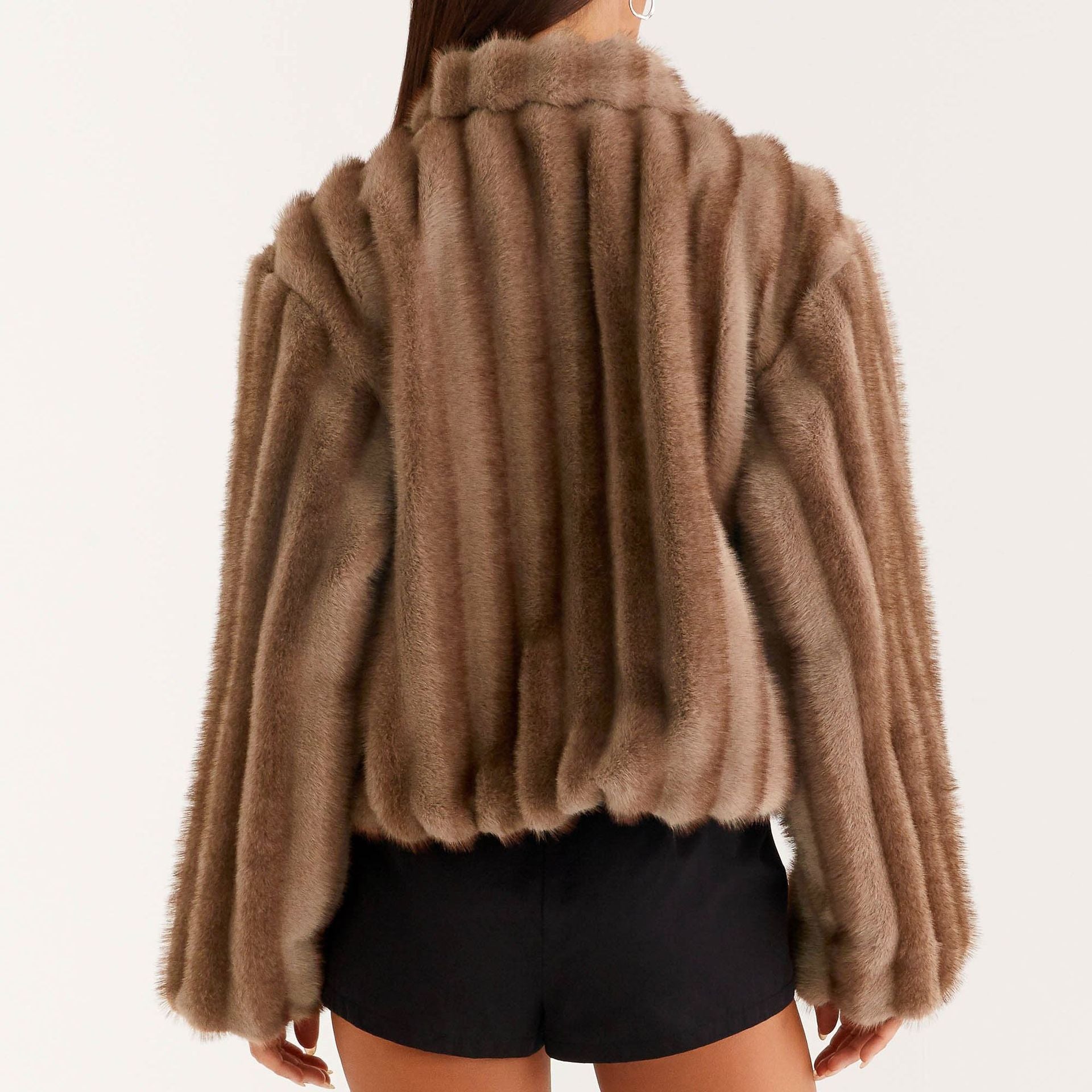Loose warm furry jacket in brown faux fur with ribbed detailing and high collar