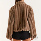 Brown faux fur jacket with ribbed detailing and high collar