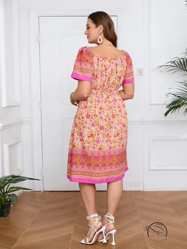 Elegant bohemian dress: plus-size puff sleeve with floral pattern and smocked waist