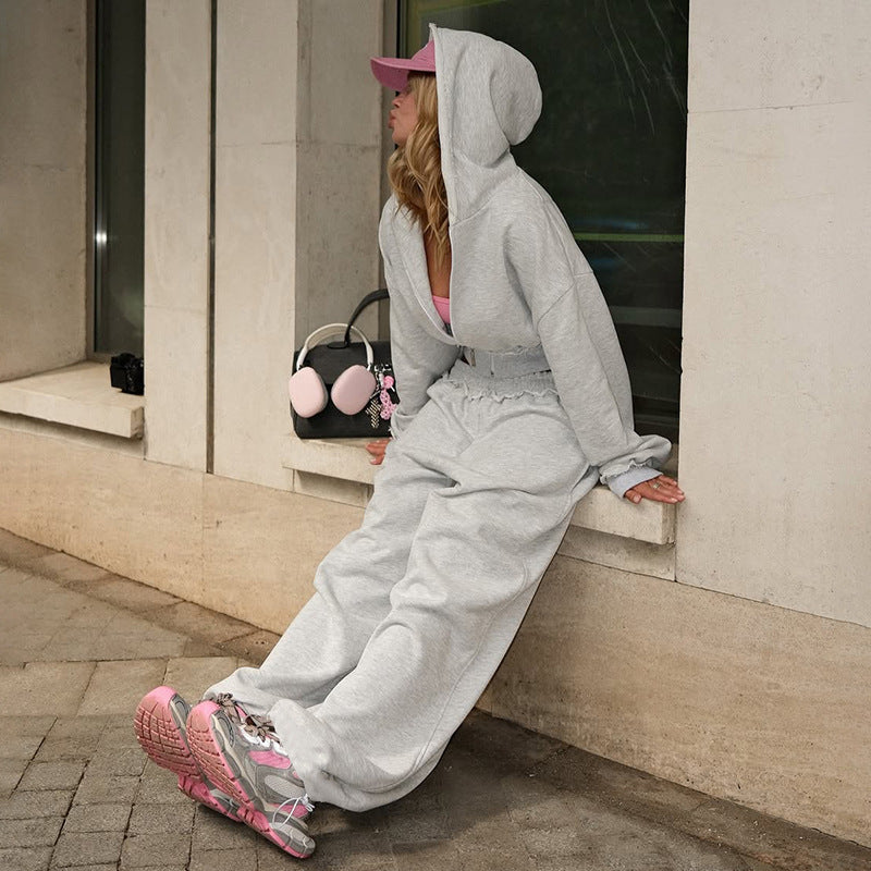Langry fashion woman in gray hooded wide-leg trousers suit