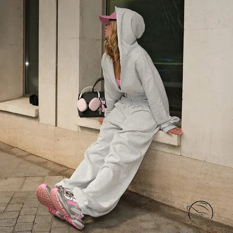 Langry fashion woman in open gray hooded sweatshirt wide leg suit