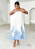 Attractive backless dress with white sundress and blue floral hem embroidery