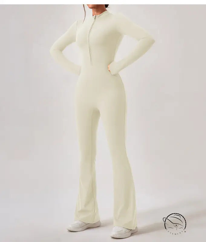 Cream-colored zip-front Comfy One Piece Sportswear jumpsuit with flared legs