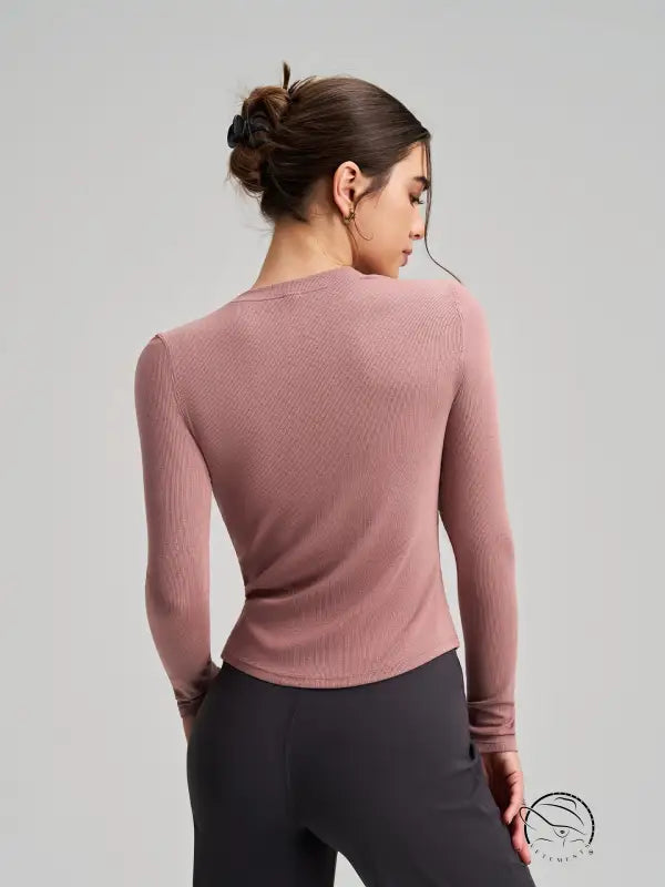 Soft rose-colored ribbed langry fashion top for yoga