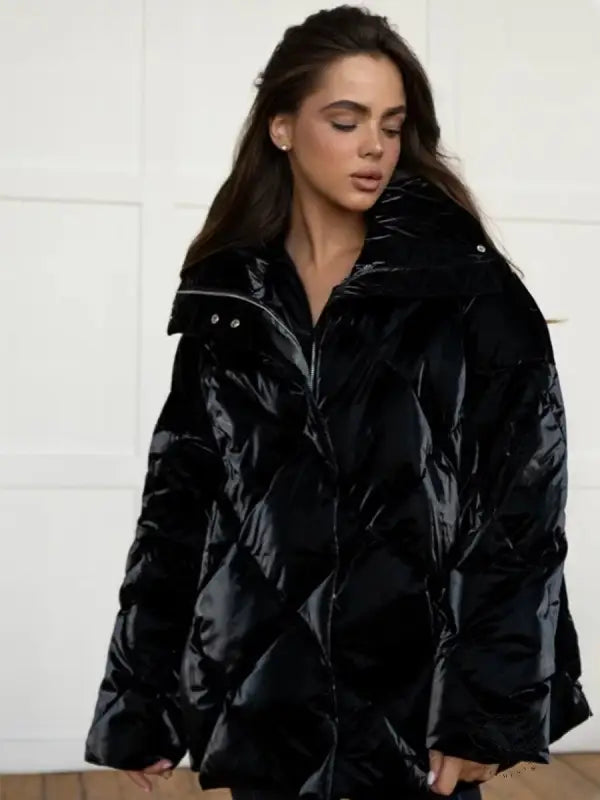 Black glossy puffer jacket in Langry fashion, quilted with hood