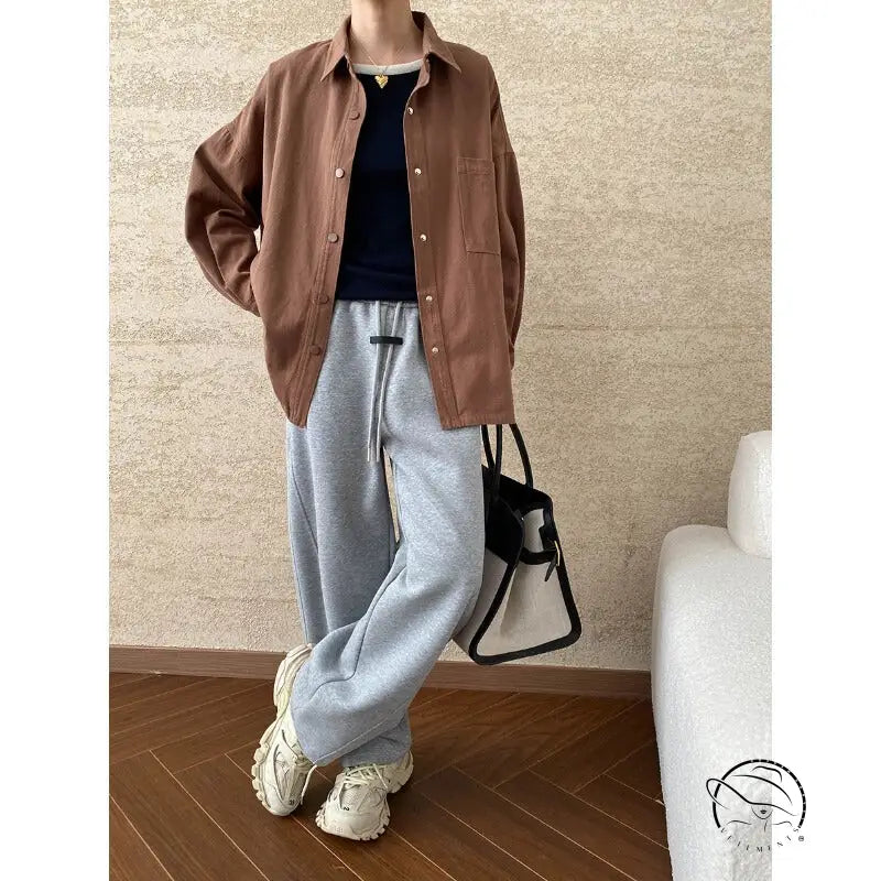 Casual brown shirt and gray sweatpants in Langry fashion ملابس