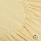 Elegant langry fashion maxi dress with cream ruffled bed skirt edge