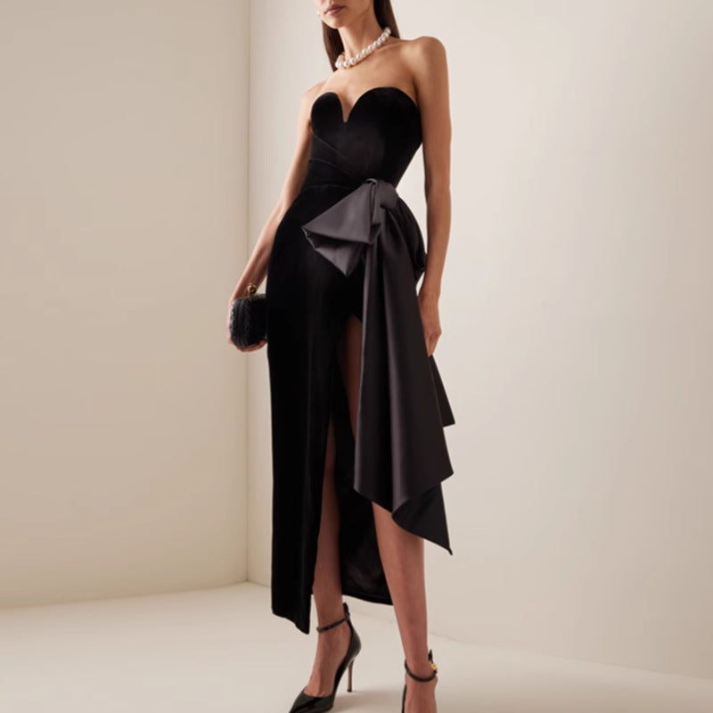 Elegant design sleeveless split dress in black velvet with ruffle hem and slit
