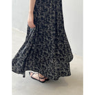 Black and white patterned maxi dress with French floral strap design