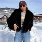 Langry faux fur effect plush coat with black jacket and brown cap