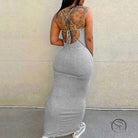 Gray form-fitting maxi sling bare back hip dress by Langry