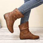 Brown slouch ankle faux leather boots in Langry fashion style