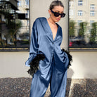 Langry fashion blue satin jumpsuit with feather accents and deep v-neck pajamas set