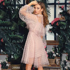 Elegant evening dress with romantic pink tulle, pearl polka dots, puffy sleeves