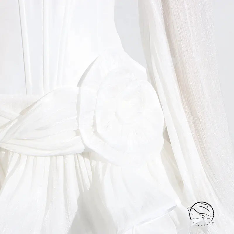 White ruffled langry fashion blouse with long sleeves and gathered neckline