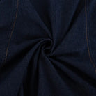 Dark blue denim shirt with yellow stitching and central swirl