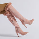 Pink thigh-high stiletto boots with fur trim, featuring a stylish high leg boot design