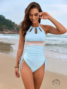 Light blue Langry one-piece swimsuit with cutouts and ruched ties