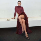Langry fashion burgundy feathered turtleneck gown with high slit and train
