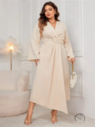 Elegant waist controlled slim dress in plus-size beige with V-neck and asymmetric hem