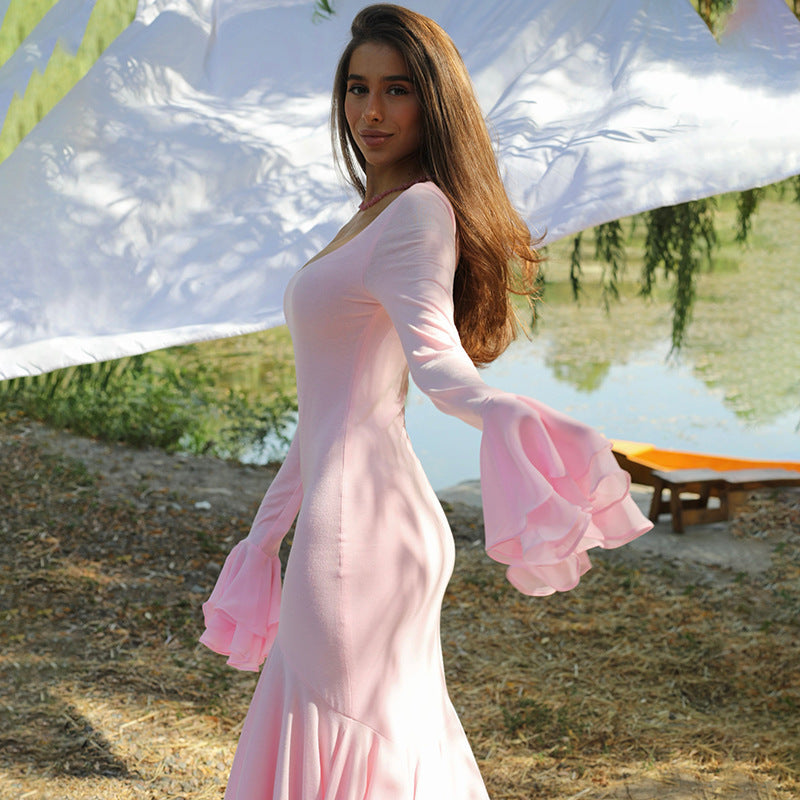 Long-sleeved pink dress with ruffled bell sleeves, perfect for modern fashion ملابس
