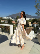 Floral puff sleeve midi dress from Enchanting collection showcasing elegant langry fashion