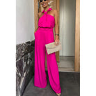 Fuchsia halter-neck jumpsuit showcasing langry fashion in a summer casual style