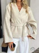 Beige textured langry fashion top with bell sleeves and tie waist