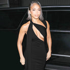 Woman in a black cutout dress showcasing the elegance of fashion and ملابس for evenings