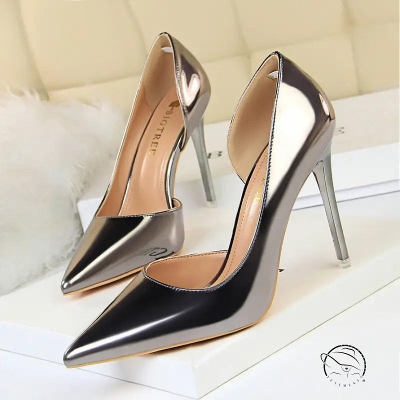 Simple stiletto heel metal pumps in silver and black metallic finish