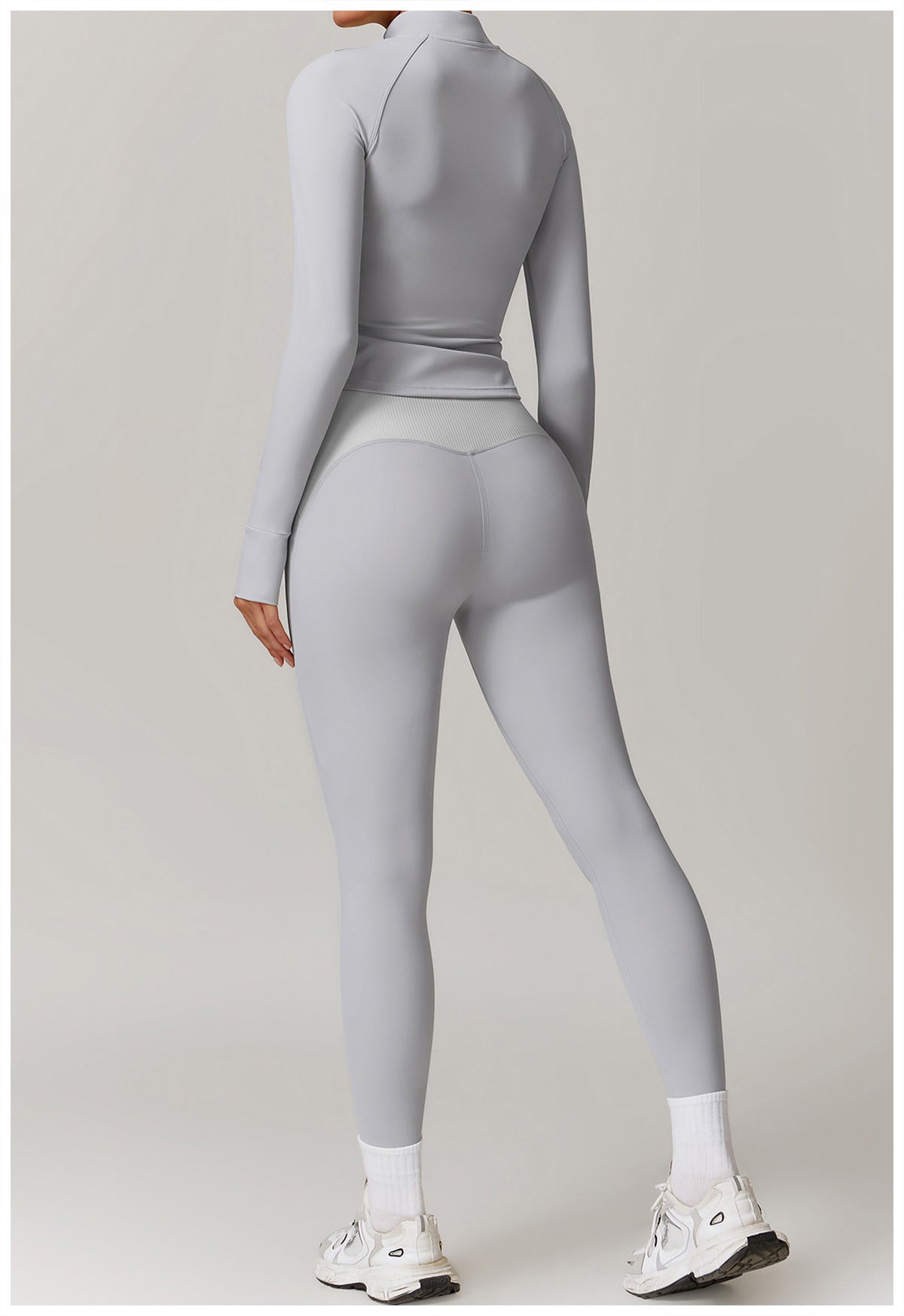 Light gray langry athletic jumpsuit with long sleeves, ideal for fashion and yoga