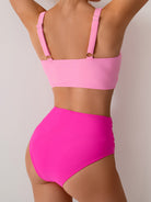 Gorgeous Split Swimsuit featuring a stylish two-tone pink design, perfect for fashion enthusiasts