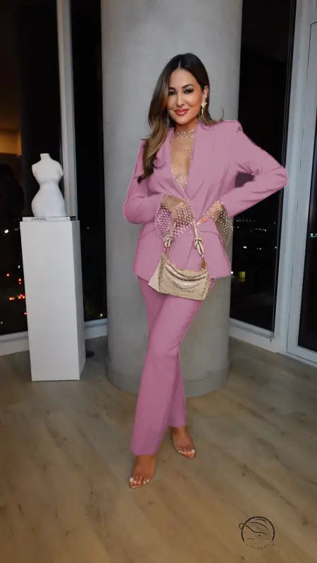 Woman in pink suit for casual professional pants two piece set