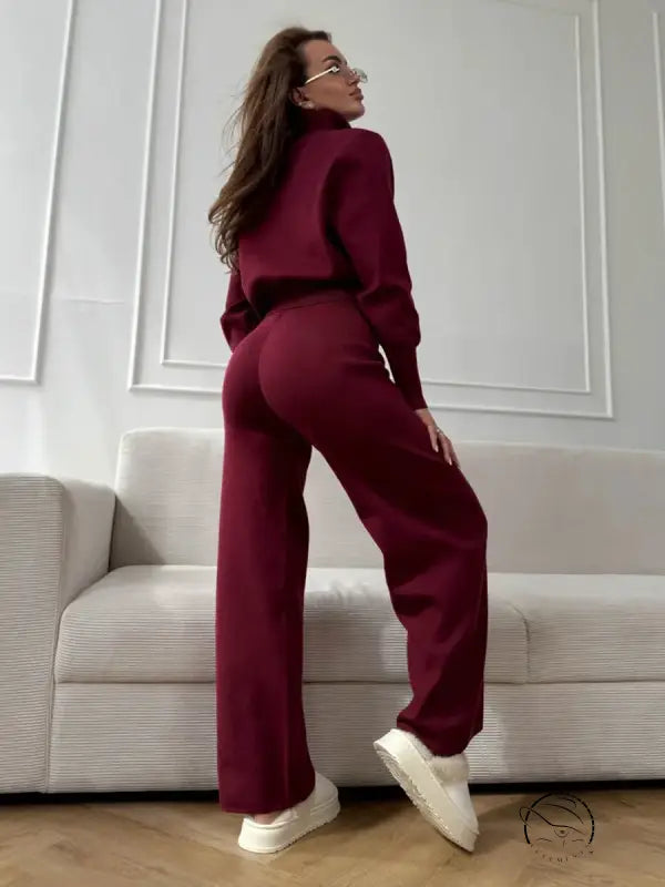 Burgundy wide-leg pants with white sneakers in langry fashion sweater set