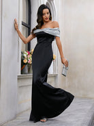 Elegant off-shoulder black gown from Langry, perfect for fashionable evening events