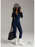 Navy blue langry fashion jumpsuit with fur hood and white boots