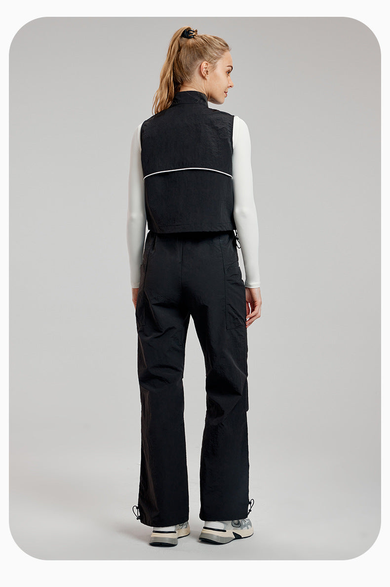 Woman in black vest and pants showcasing Comfy Loose Sports Vest for stylish langry ملابس