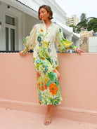 Floral print midi dress showcasing long sleeve design for casual summer fashion