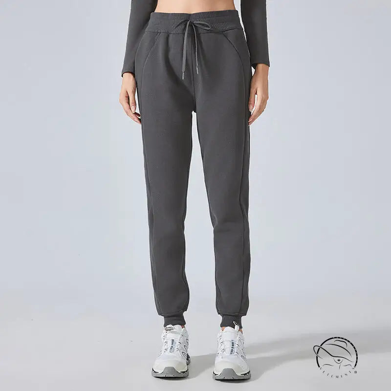 Dark gray casual loose tapered sports pants with drawstring and elastic cuffs