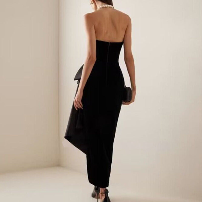 Elegant design sleeveless split dress in black with asymmetrical hem and gold heels