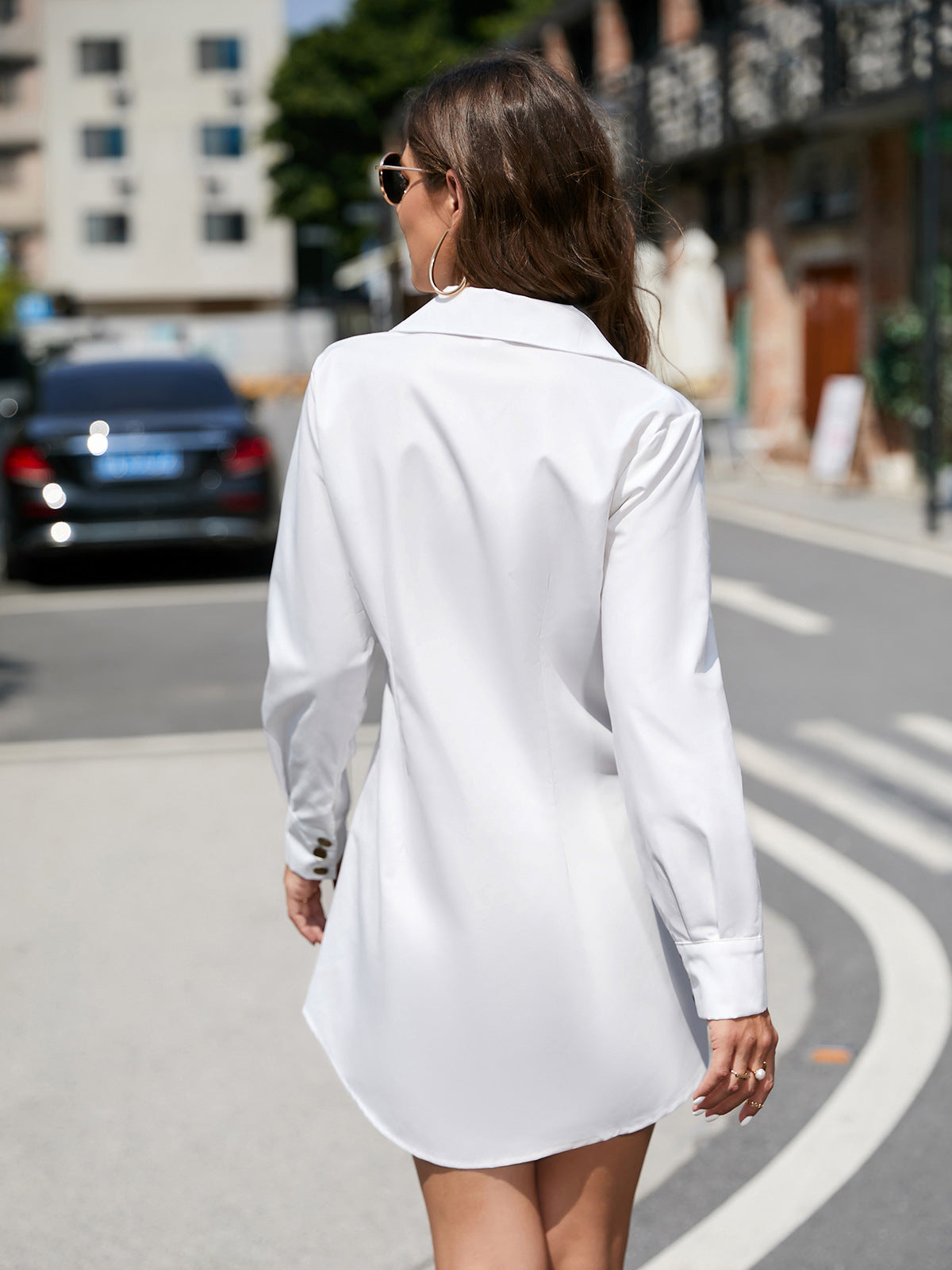 White button-down shirt dress showcasing the elegance of long sleeve fashion